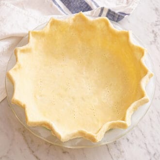 A buttery pie crust ready to be baked.