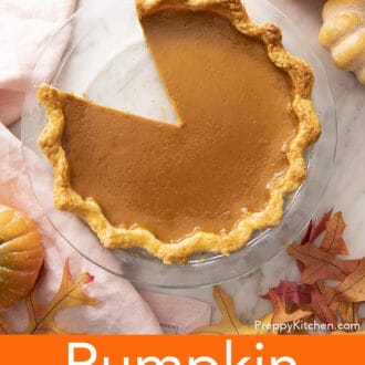 Pinterest graphic of an overhead shot of a pumpkin pie surrounded by fall decor.