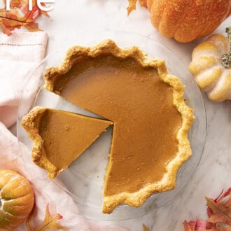 Pinterest graphic of an overhead shot of a pumpkin pie in a glass dish.