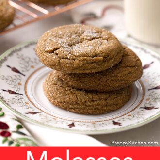 Pinterest graphic of three molasses cookies on a holiday plate next to a glass of milk.