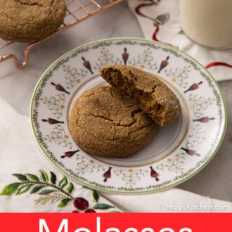 Pinterest graphic of a broken and whole molasses cookie on a Christmas plate.