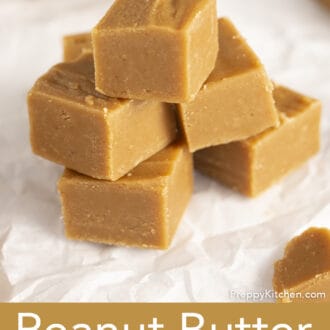 Pinterest graphic of a stack of peanut butter fudge on parchment paper.