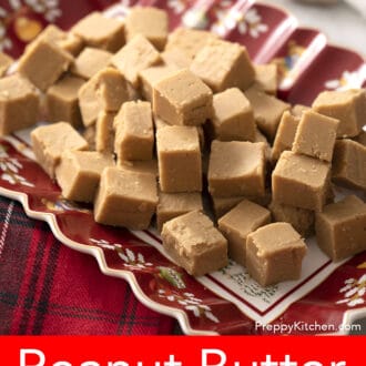 Pinterest graphic of peanut butter fudge pieces sitting on a red holiday themed tray.