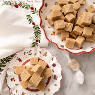 Pinterest graphic of two plates of peanut butter fudge.