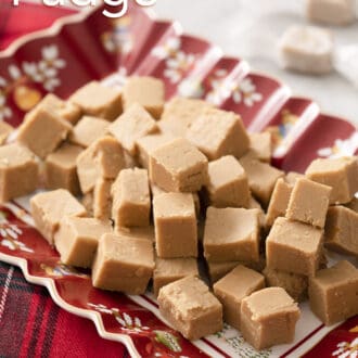 Pinterest graphic of peanut butter fudge pieces sitting on a christmas tray.