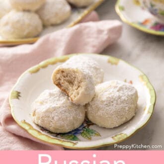 Pinterest graphic of Russian tea cakes on a green and white plate.