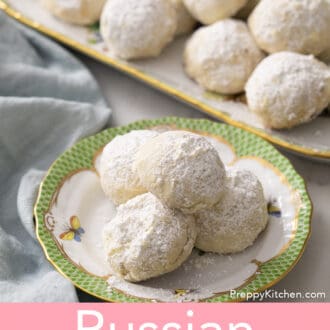Pinterest graphic of Russian tea cakes on a green and white plate.