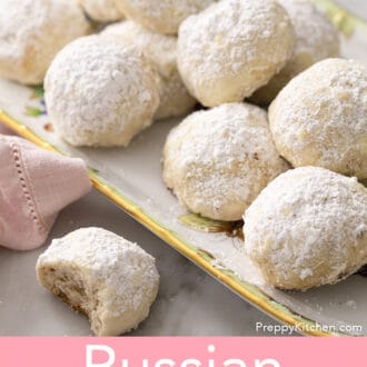 Pinterest graphic of several Russian tea cakes on a tray.