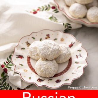 Pinterest graphic of Russian tea cakes on a Christmas plate.