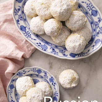 Pinterest graphic of Russian tea cakes on a blue and white patterned plate.