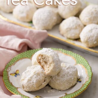 Pinterest graphic of three Russian tea cakes sitting on a plate. More in the background.