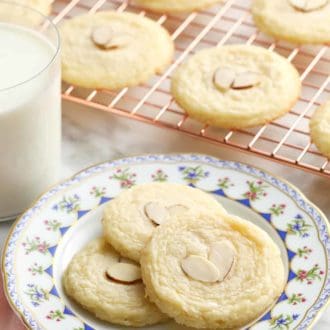 stack of almond cookies on a plate