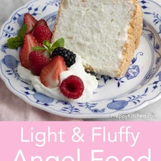 Pinterest graphic of a slice of angel food cake on a plate with berries and whipped cream.