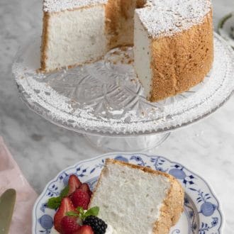 Pinterest graphic of an angel food cake on a glass cake stand with a slice plated in front.
