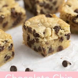 Pinterest graphic of a close up of a chocolate chip cookie bar.