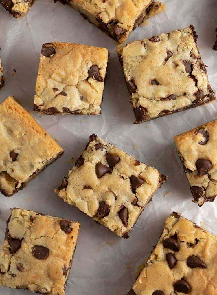 Overhead shot of chocolate Chip Cookie Bars on parchment paper.