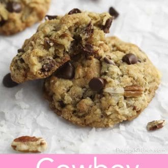 Pinterest graphic of a stack of cowboy cookies on parchment paper.