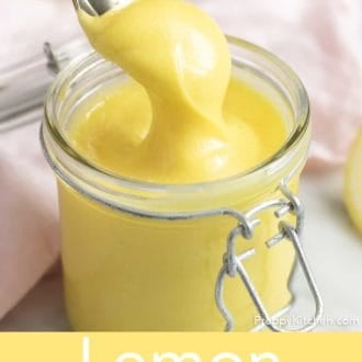 Pinterest graphic of lemon curd in a glass jar with a spoon dipped in.