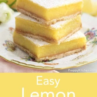 lemon bars stacked on a plate