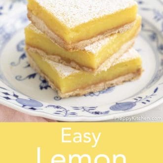 lemon bars stacked on a plate