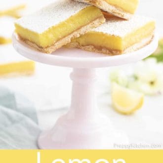 lemon bars stacked on a stand