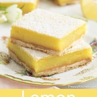 lemon bars stacked on a plate