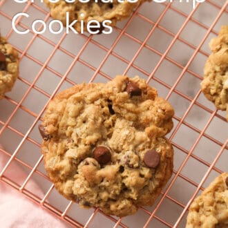 A top-down shot of Oatmeal Chocolate Chip Cookies on a cooling rack.