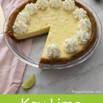 Pinterest graphic showing key lime pie in a glass pie dish with limes scattered around.
