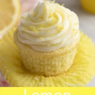 Pinterest graphic of lemon cupcake with lemon frosting with the paper liner pulled down.