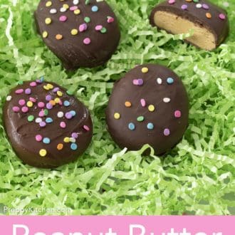 peanut butter eggs on a bed of fake easter grass