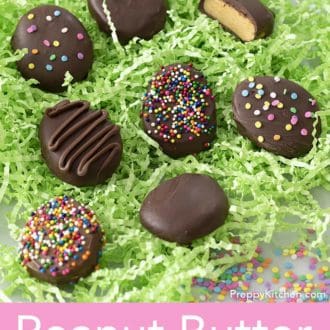 peanut butter eggs on a bed of easter basket grass