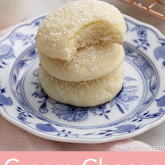 cream cheese cookies stacked on a plate