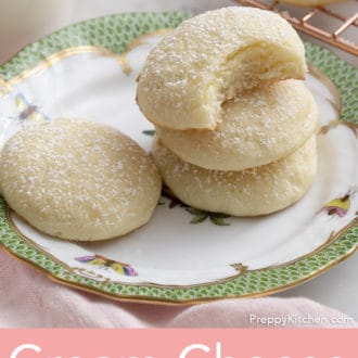 cream cheese cookies stacked on a plate
