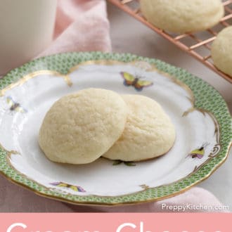 cream cheese cookies stacked on a plate