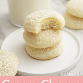 cream cheese cookies stacked on a plate