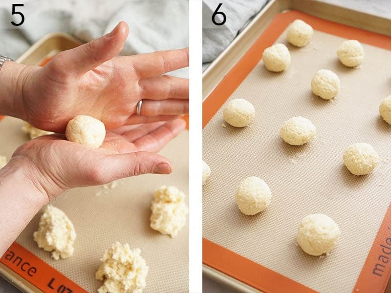 Cream cheese cookies are rolled out and placed on a baking sheet lined with silicon before going into the oven.