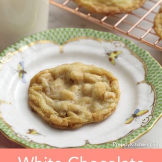 Pinterest graphic of a white chocolate macadamia cookie on a plate.