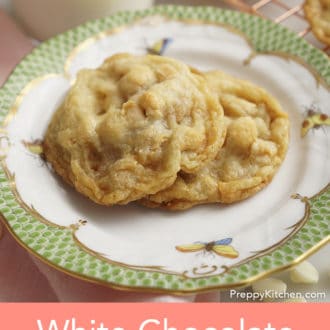 Pinterest graphic showing white chocolate macadamia cookies on a plate.