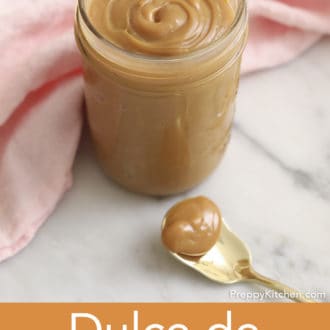 glass jar of dulce de leche on counter