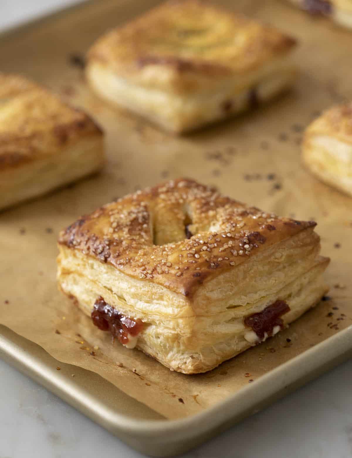 Guava pastilitos on a baking sheet fresh out of the oven.