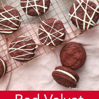 Pinterest graphic of an overhead view red velvet cookies on a cooling rack. Ones on the rack are drizzled with white chocolate.