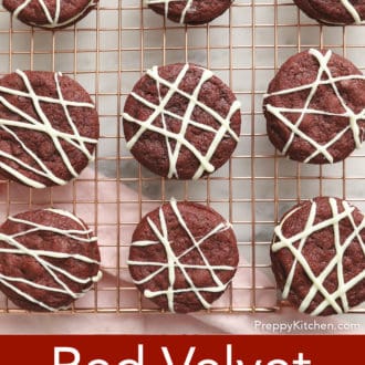 Pinterest graphic of an overhead view red velvet cookies drizzled with white chocolate on a cooling rack.