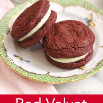Pinterest graphic of two red velvet cookies on a plate.
