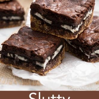 slutty brownies stacked on parchment paper