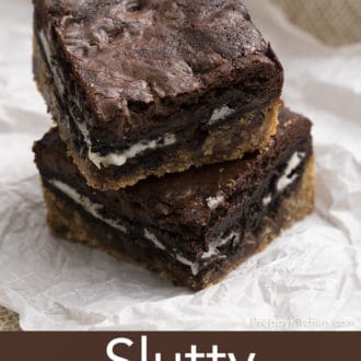 slutty brownies stacked on parchment paper