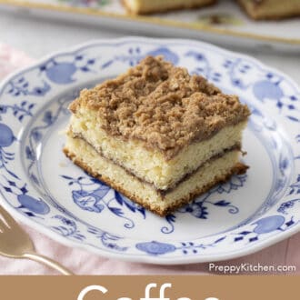 Pinterest graphic of a piece of coffee cake with a streusel topping on a plate.