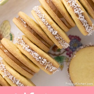 Pinterest graphic of alfajores cookies on a porcelain serving tray.