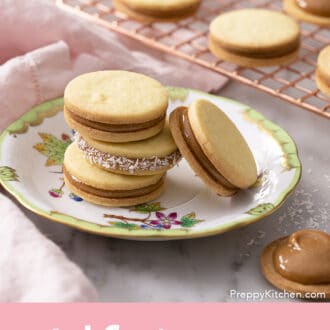 Pinterest graphic of a four alfajores cookies on a plate.