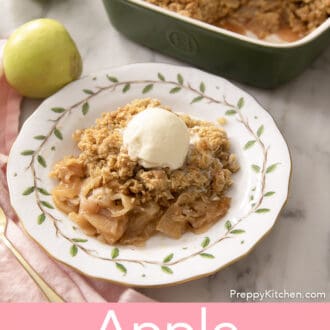 Pinterest graphic of apple crisp on a plate with painted leaves topped with ice cream.