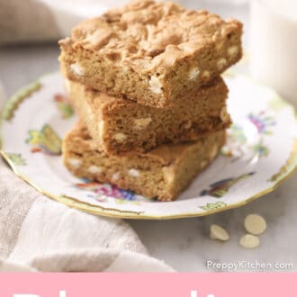 Three blondies on a porcelain plate.